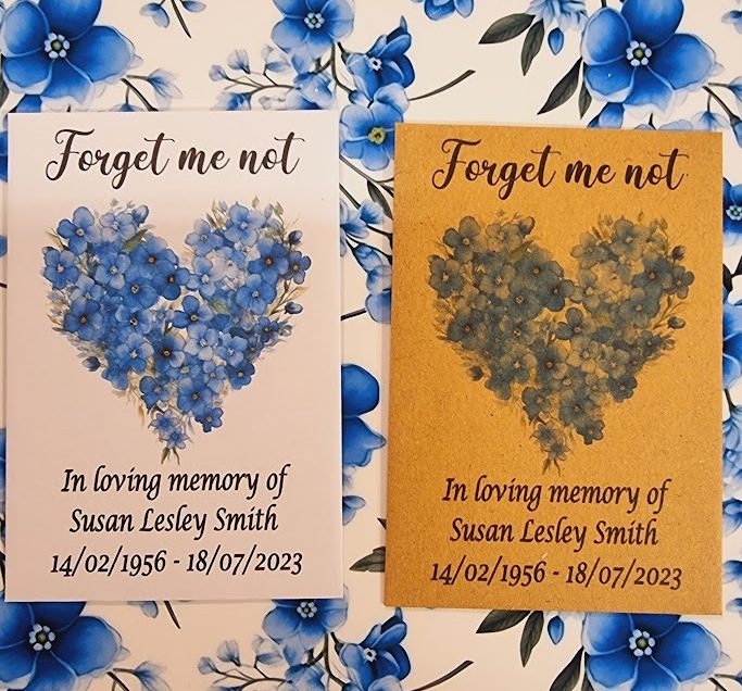 white and brown funeral forget me not seed packets