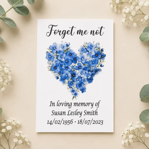 Personalised remembrance seed packet favour featuring a blue Forget Me Not floral heart.